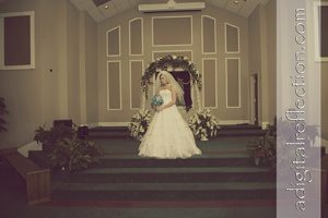 Tabatha & Evan were married at Hartselle First Assembly of God. Professional wedding photography by Birmingham Professional Wedding Photographers